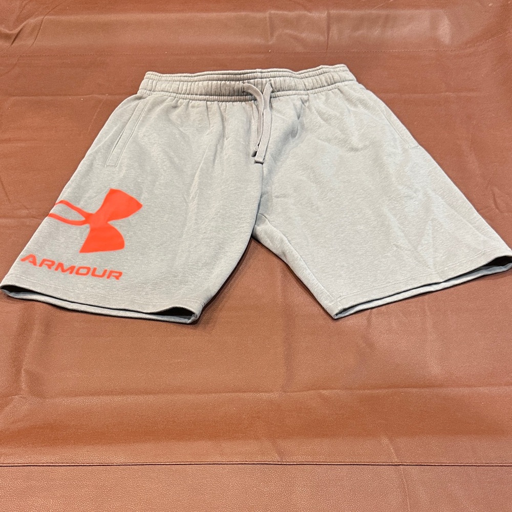 Under Armour Men's Light Gray Athletic Shorts with Orange Logo